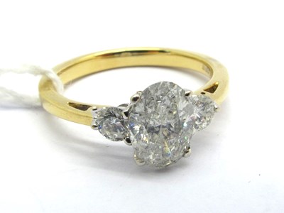 Lot 168 - A Modern 18ct Gold Three Stone Diamond Ring,...