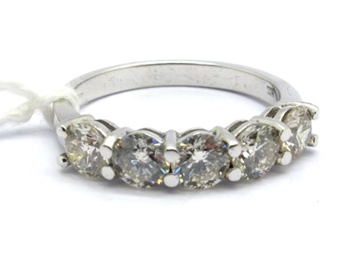 Lot 167 - A Modern 18ct White Gold Five Stone Diamond...