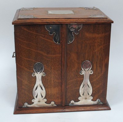 Lot 1266 - An Early XX Century Oak Cased Smokers Cabinet,...