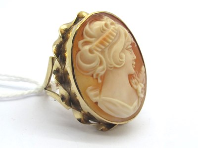 Lot 180 - A 9ct Gold Oval Shell Carved Cameo Dress Ring,...