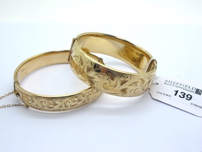 Lot 139 - A 1/5 9ct Metal Core Hinged Bangle, leaf...