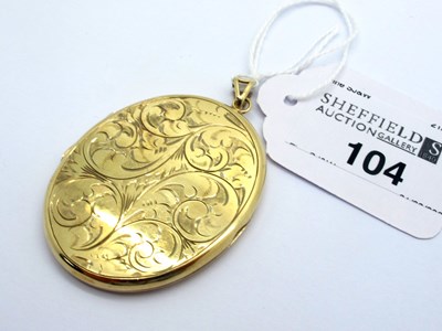 Lot 104 - A Large 9ct Gold Oval Locket Pendant, leaf...