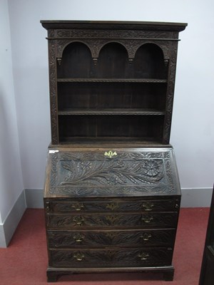 Lot 1566 - XVIII Century and later oak bureau bookcase...