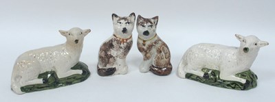 Lot 1049 - A Pair of Staffordshire Pottery Models of Cats...