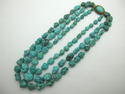 Lot 150 - A Three Row Graduated Turquoise Bead Necklace,...