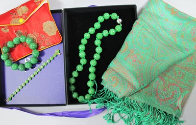 Lot 20 - A Modern Burmese Green Jade Bead Necklace, of...