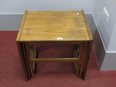 Lot 1562 - Nest of three teak coffee tables in the G Plan...