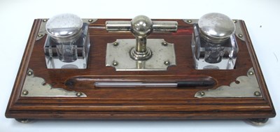 Lot 1359 - An Edwardian Oak Inkstand, with plated mounts,...