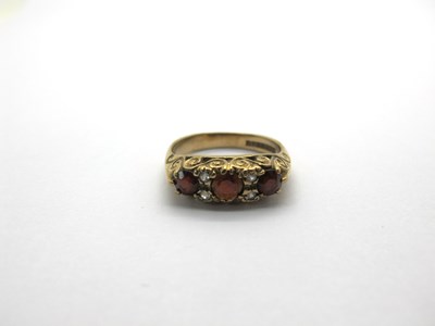 Lot 204 - A 9ct Gold Three Stone Garnet Ring, Victorian...