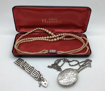 Lot 185 - A Large Hallmarked Silver Oval Locket Pendant,...