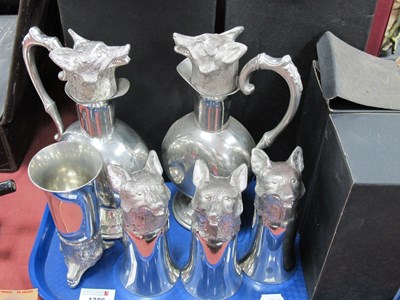 Lot 1386 - Set of Four Pewter Stirrup Cups, each with fox...