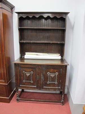 Lot 1519 - 1930's Oak Dresser, with a shaped cornice, two...