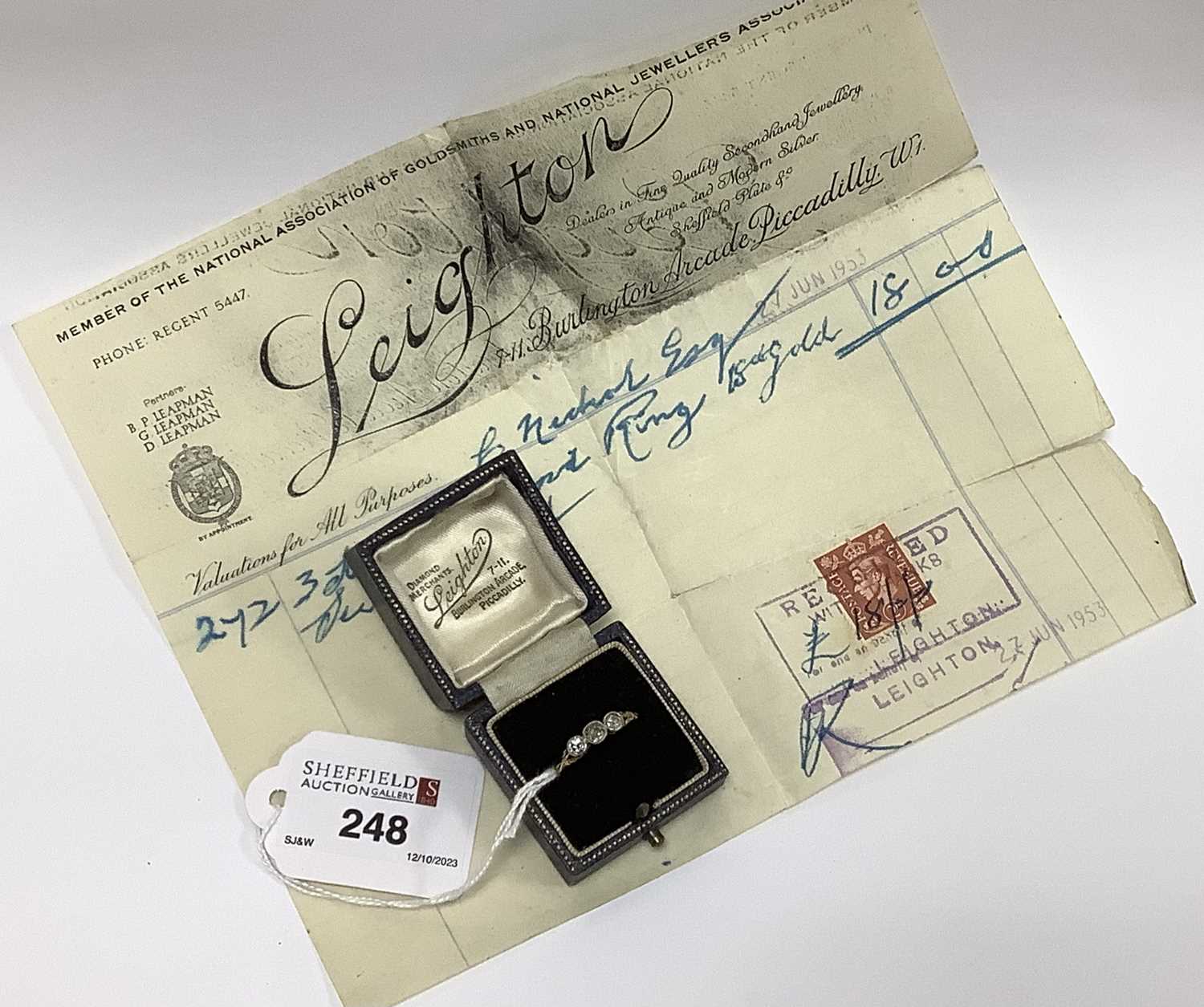Lot 248 - A Three Stone Diamond Ring, the old cut stones...