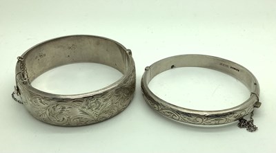 Lot 197 - A Hallmarked Silver Hinged Bangle, leaf scroll...