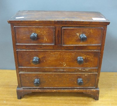 Lot 1341 - XIX Century Miniature Stained Wood Chest of...