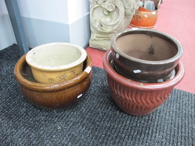 Lot 1136 - A collection of five stoneware plant pots four...