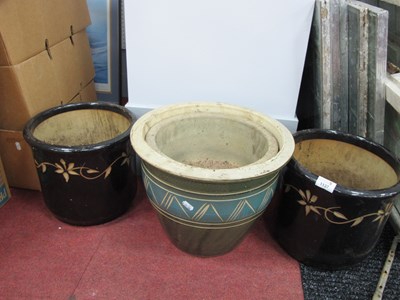 Lot 1137 - A collection of four glazed stoneware plant...