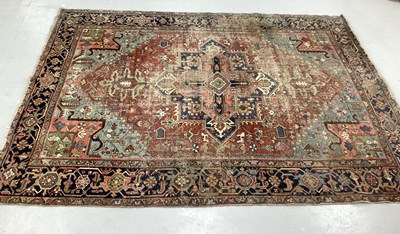 Lot 1489 - Persian Style Wool Carpet, with geometric and...