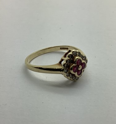 Lot 238 - A Modern 9ct Gold Cluster Ring, shaped collet...