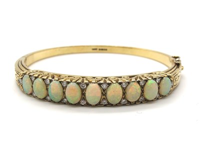 Lot 134 - A 9ct Gold Victorian Style Opal and Diamond...