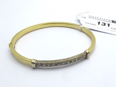 Lot 131 - A Modern Inset Bangle, to snap clasp, stamped "...