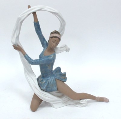 Lot 1080 - A Nao Pottery Figurine of a Dancer with Veil,...