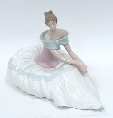 Lot 1077 - A Nao Pottery Figurine 'Hope', a seated ballet...