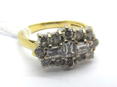 Lot 184 - An 18ct Gold Diamond Cluster Ring, claw set...