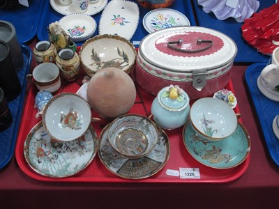 Lot 1226 - Oriental - Three hand painted tea cups and...