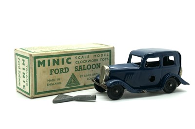 Lot 631 - A Post War Tinplate Minic Clockwork Ford...