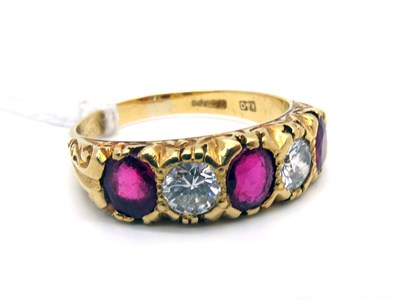Lot 191 - An 18ct Gold Ruby and Diamond Five Stone Ring,...