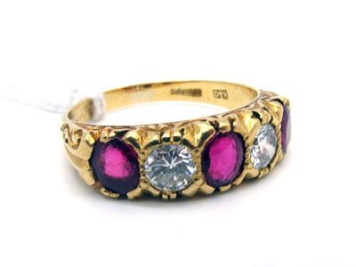 Lot 193 - An 18ct Gold Ruby and Diamond Five Stone Ring,...