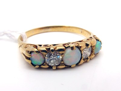 Lot 192 - A Victorian Style Opal and Diamond Five Stone...