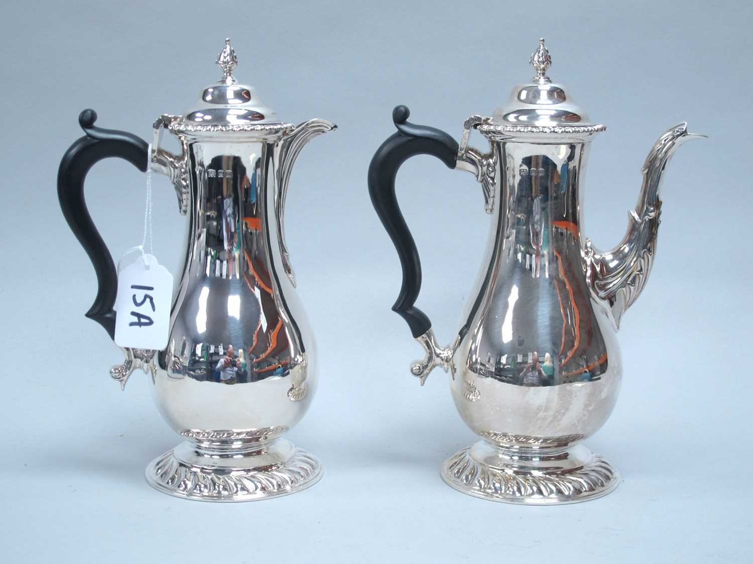 Lot 15 - A Hallmarked Silver Coffee Pot and Matching...