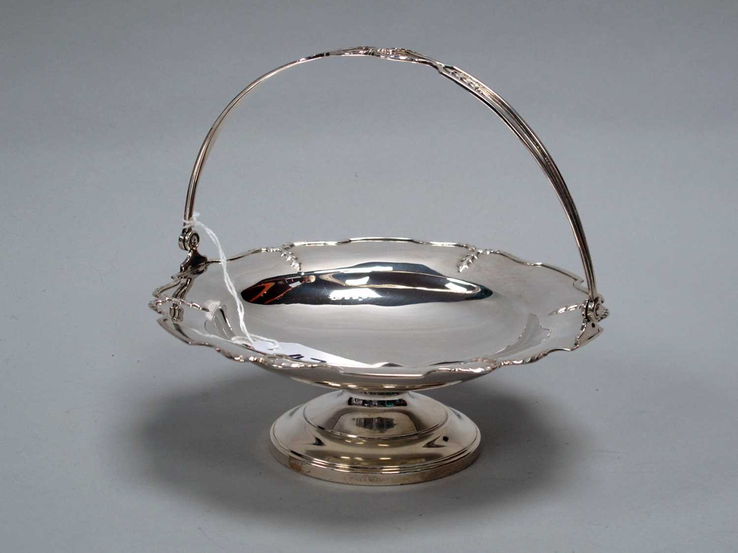 Lot 47 - A Hallmarked Silver Swing Handled Footed Dish,...