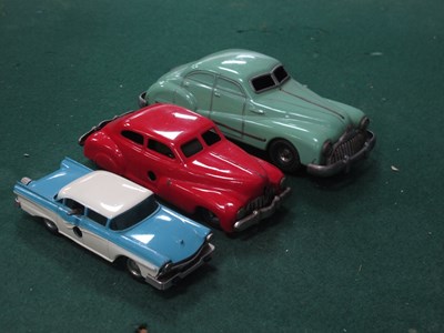 Lot 566 - Three Mid XX Century Clockwork Toy Cars, a...