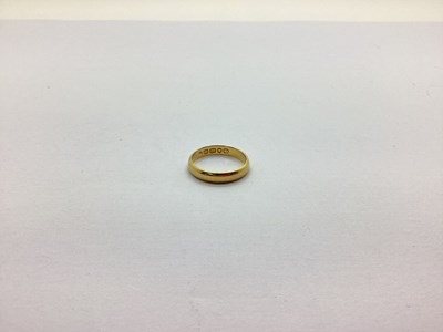 Lot 242 - A 22ct Gold Wedding Band, of plain design,...