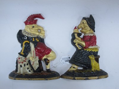 Lot 1429 - Punch and Judy, a pair of hand painted cast...