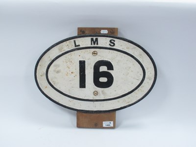 Lot 1465 - LMS 16, cast iron oval plaque, possibly for...