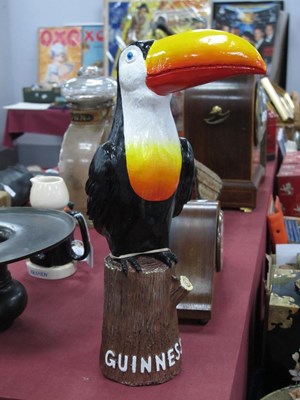 Lot 1421 - A resin Guinness toucan hand painted figure...