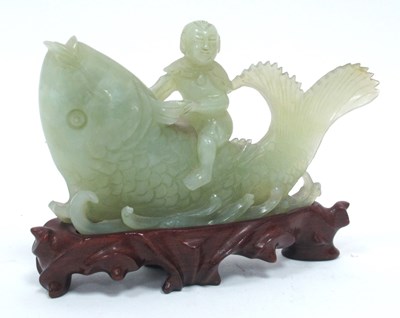 Lot 1141 - A XX Century Chinese Jade Carving of a Boy...