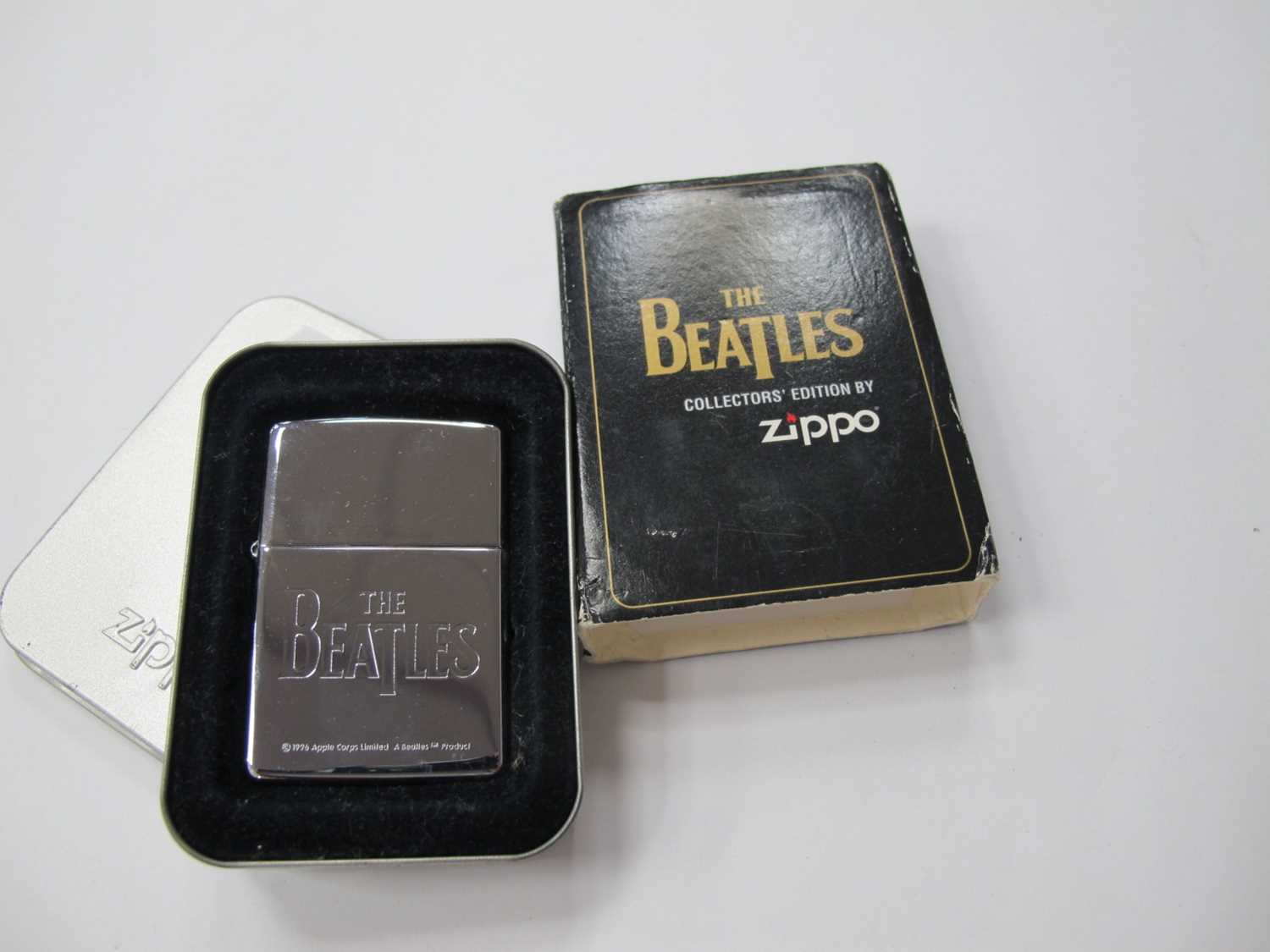 Lot 1300 - The Beatles Zippo lighter and box, from the...