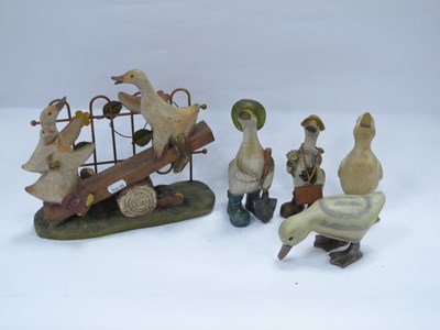 Lot 1446 - A collection of five resin figurines of ducks...