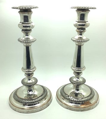 Lot 103 - A Pair of Plated on Copper Candlesticks, each...