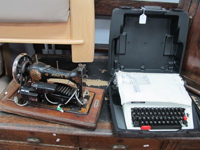 Lot 1121 - Hermes 305 Typewriter. Jones sewing machine (2).