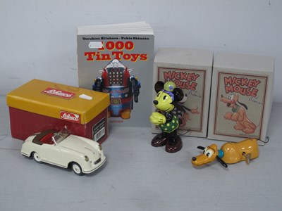 Lot 522 - Two Modern Retro Toy Tinplate Clockwork Disney...