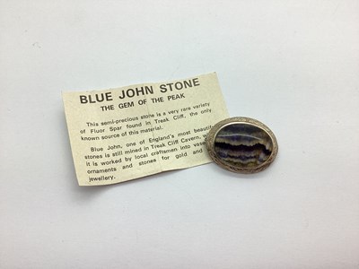 Lot 197 - An Oval Blue John Panel Brooch, the textured...