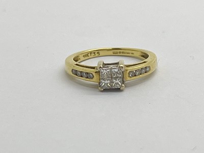 Lot 224 - An 18ct Gold Stone Set Ring, the four princess...