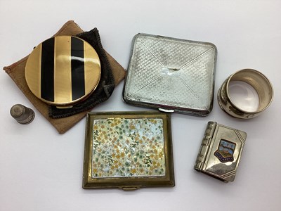 Lot 119 - Powder Compacts, a hallmarked silver napkin...