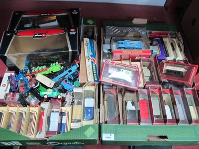 Lot 1046 - A collection of boxed model cars to include...